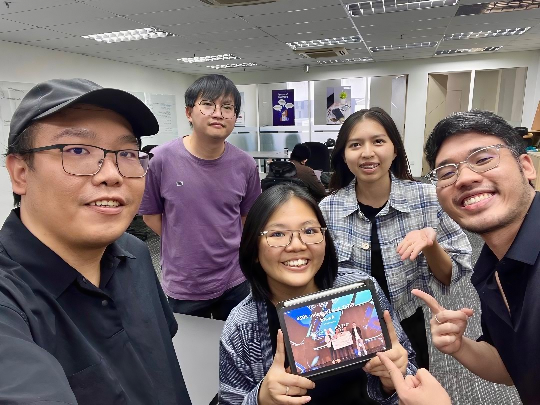 The OmniNexus team: Office selfie